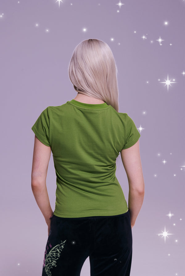 Displays a model wearing the Disney Piquant Green 'Juicy' branded Believes in juicy tee 