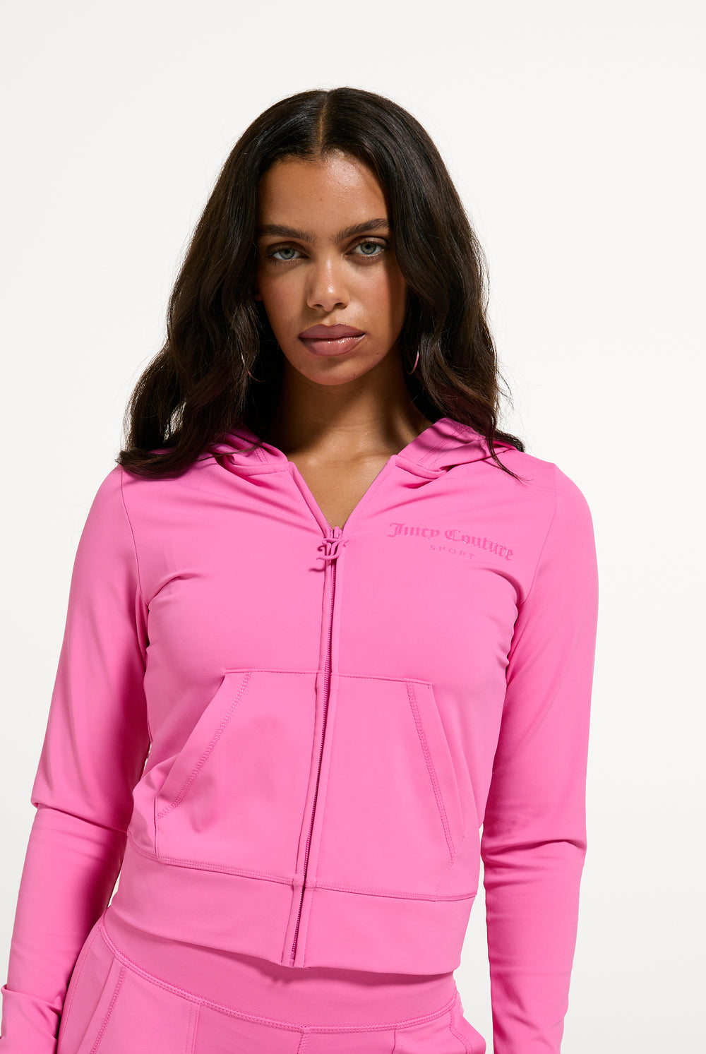 Displays a model wearing the Wild Orchid 'Juicy' branded Active Fitted Hoodie