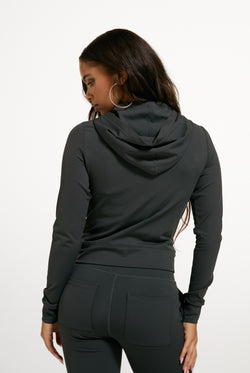 Displays a model wearing the Raven 'Juicy' branded Active Fitted Hoodie