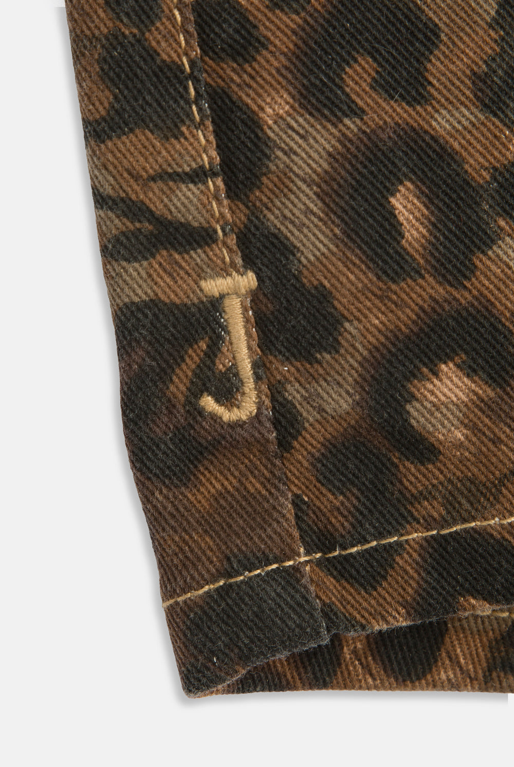 Displays the animal 'Juicy' branded denim lace up shorts featuring the juicy branding 