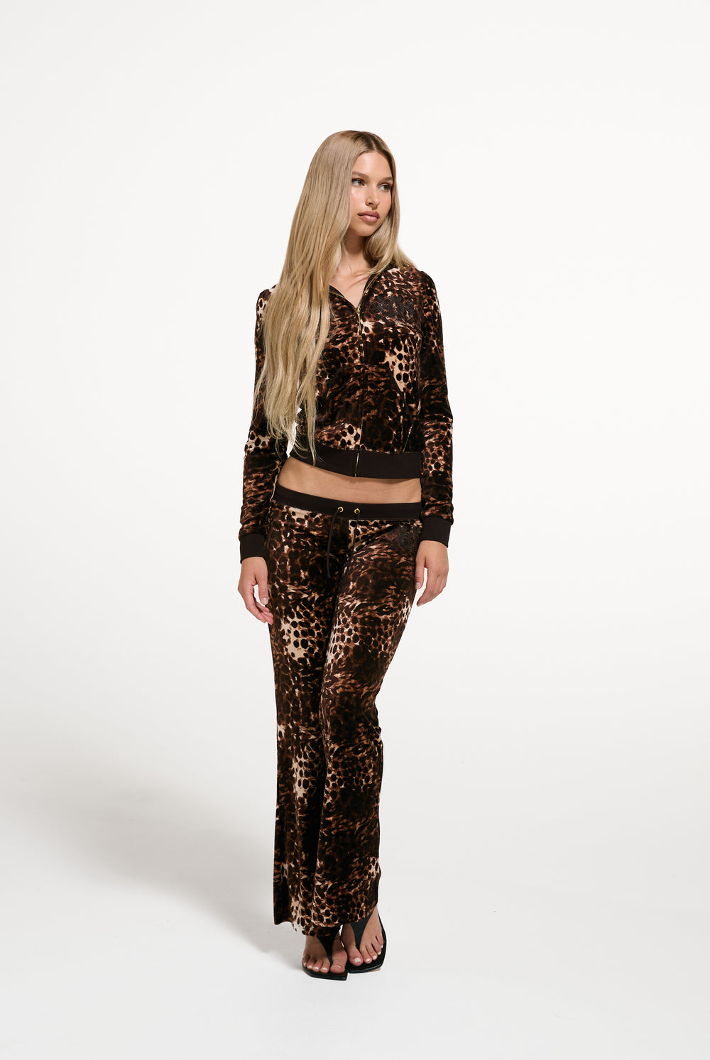 Displays a model wearing the Java 'Juicy' branded Abstract Animal Puff Sleeve Robyn Hoodie