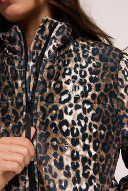Displays a model wearing the leopard print velour 'Juicy' branded puffa jacket featuring the juicy Couture logo