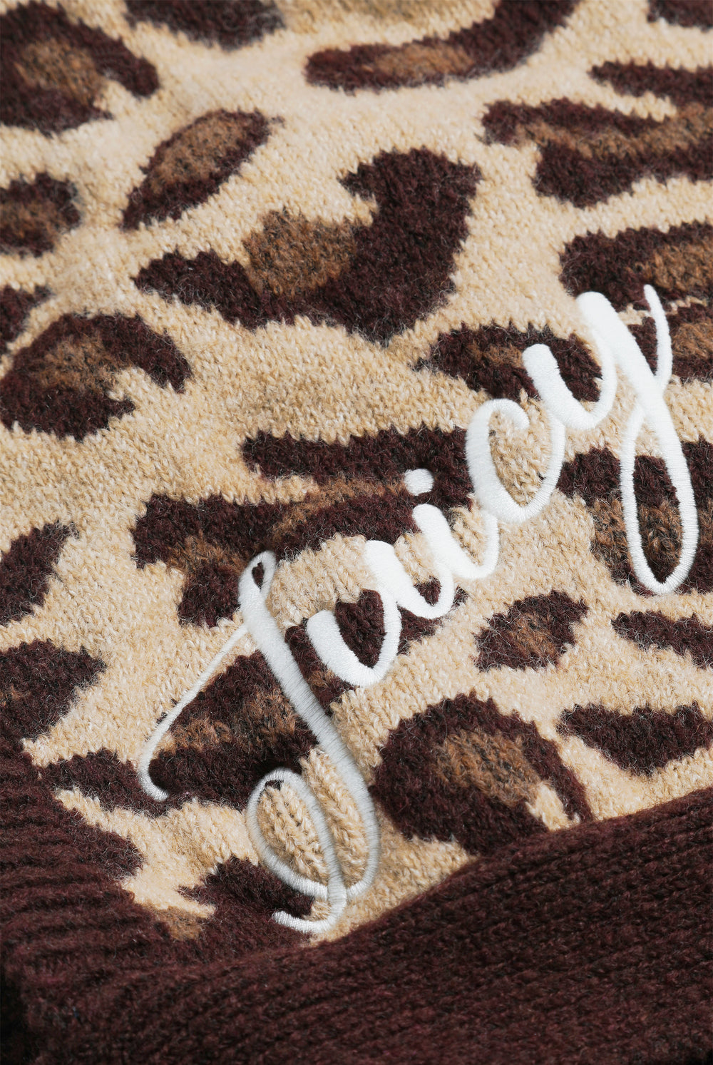 Displays the Leopard Print 'Juicy' branded Bonnet With Bow featuring the juicy branding 