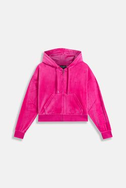 Displays the Nostalgia Pink 'Juicy' branded pink crop oversized classic velour hoodie 