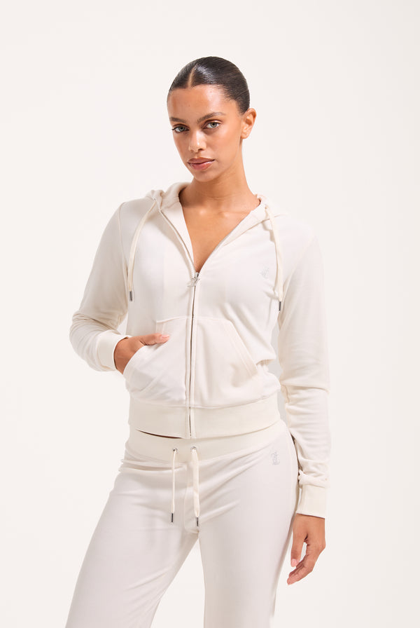 Displays a model wearing the Bridal 'Juicy' branded classic velour hoodie 