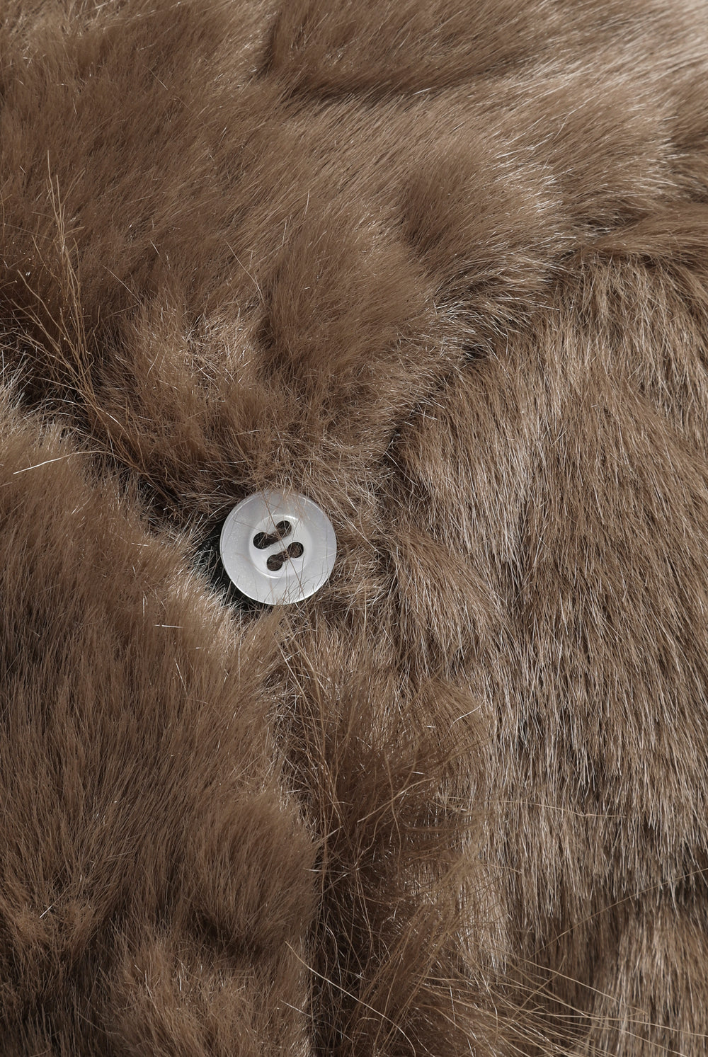 Displays the Java 'Juicy' branded Cable Knit Trapper With Fur Lining featuring the close up on the details