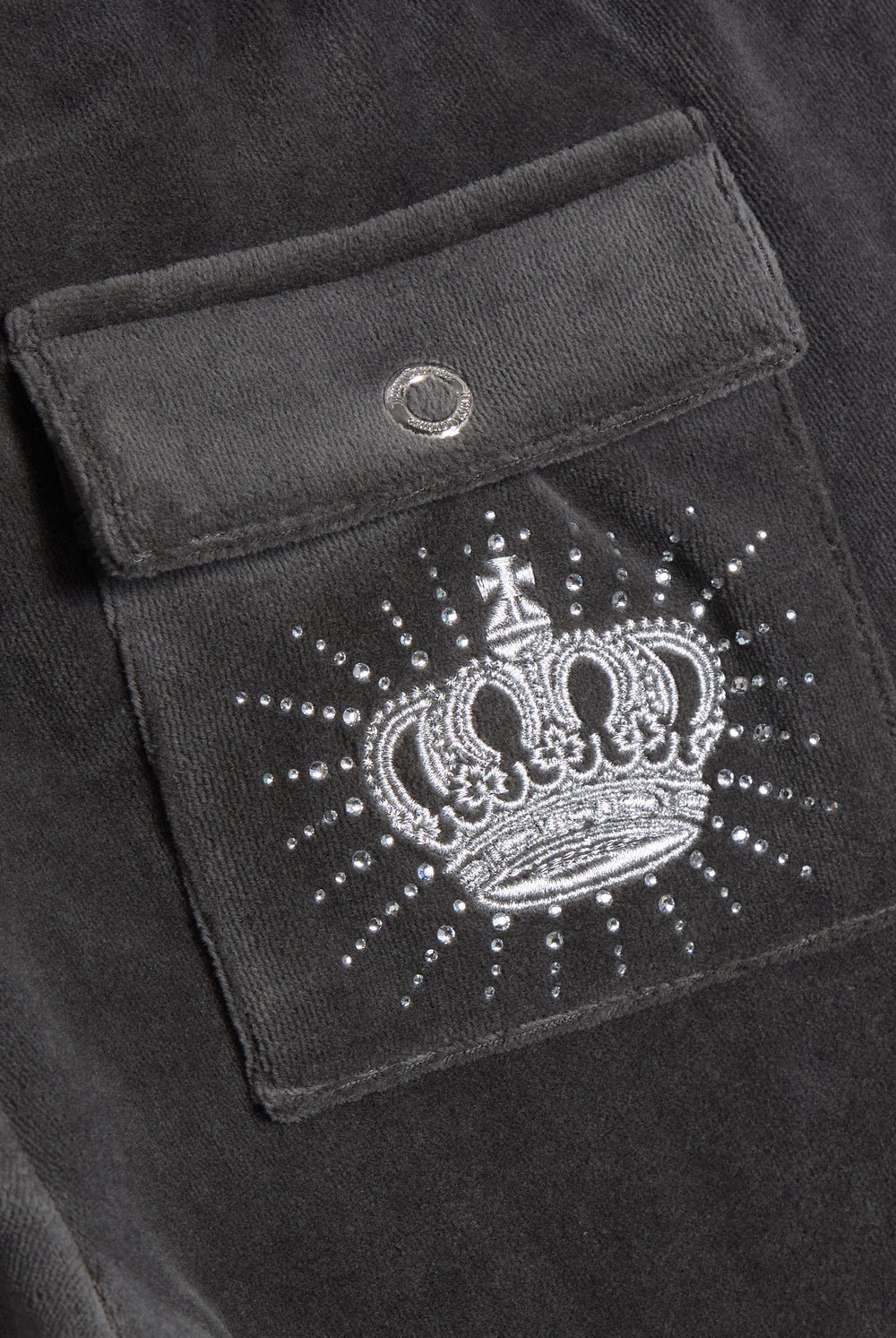 Displays the Raven 'Juicy' branded Regal Rebelle Caisa Ultra Low Rise Pant featuring the juicy branding 