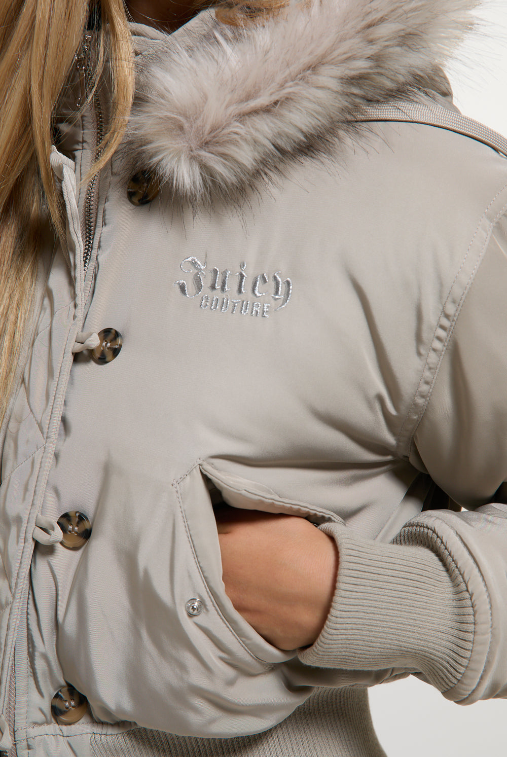 Displays a model wearing the String 'Juicy' branded Nylon Bomber