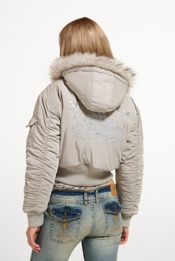 Displays a model wearing the String 'Juicy' branded Nylon Bomber