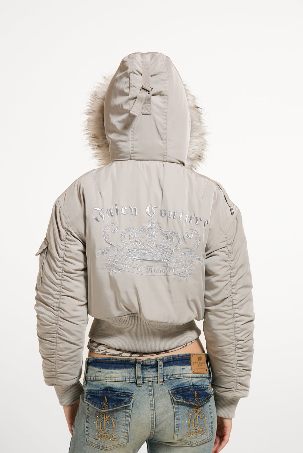 Displays a model wearing the String 'Juicy' branded Nylon Bomber