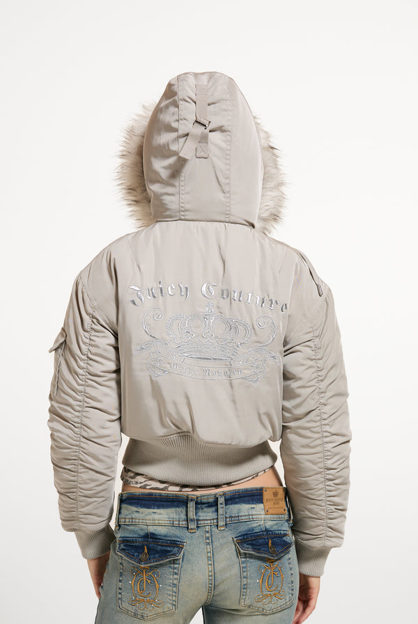 Displays a model wearing the String 'Juicy' branded Nylon Bomber
