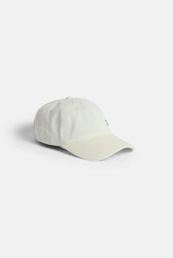 Displays the Ecru distressed 'Juicy' branded cotton denim cap 