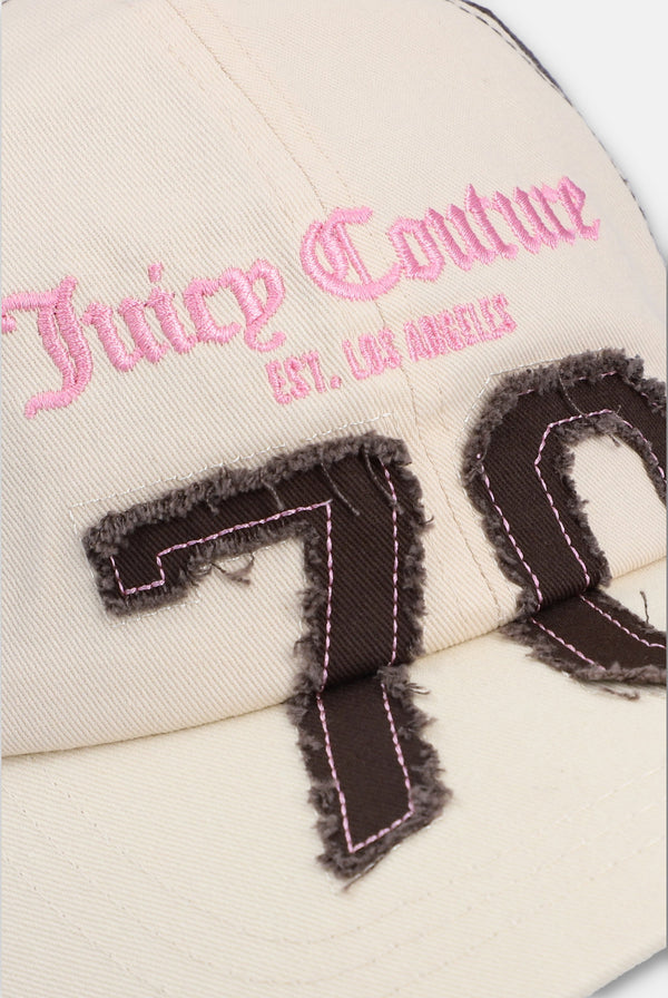 Displays the Ecru/java 'Juicy' branded cap featuring the juicy branding 