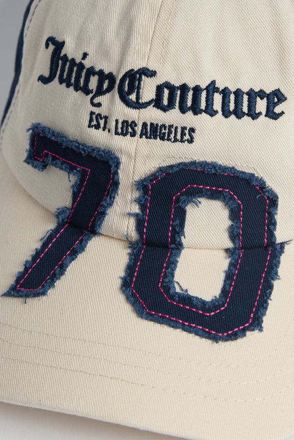 Display the Ecru/Night 'Juicy' branded sky cap