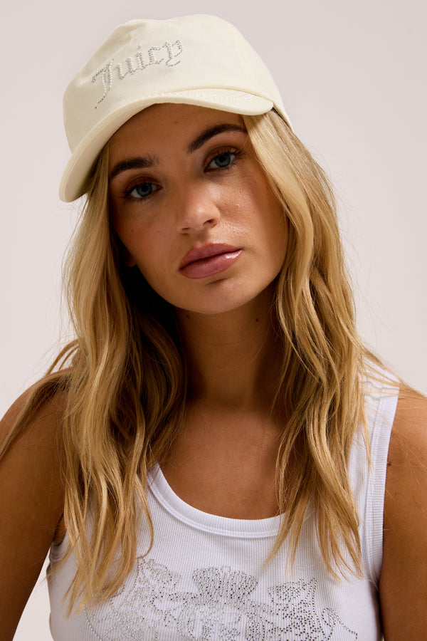 Displays a model wearing the Ecru Diamanté 'Juicy' branded cotton cap 