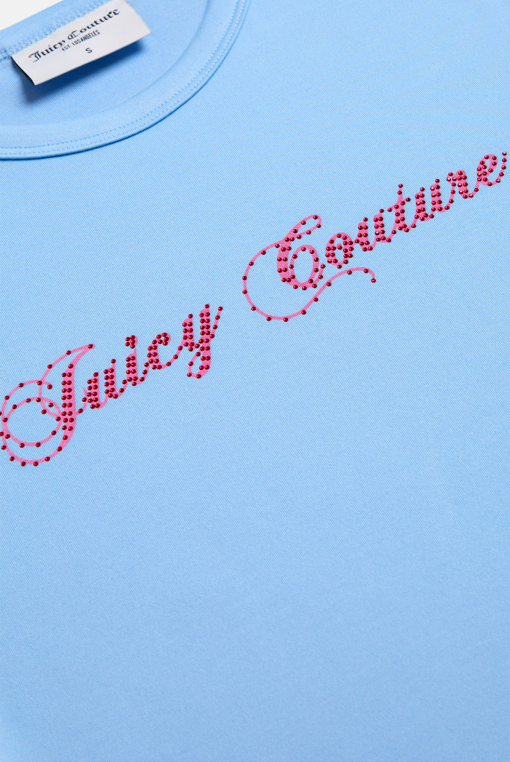 Displays the Powder Blue 'Juicy' branded Script Diamante Baby Tee featuring the details on the juicy branding 