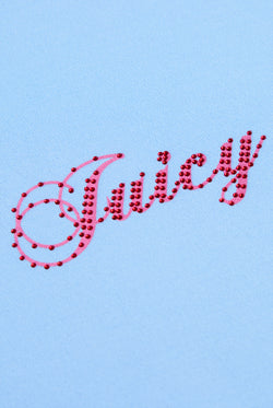 Displays the Powder Blue 'Juicy' branded Script Diamante Baby Tee featuring the details on the juicy branding 