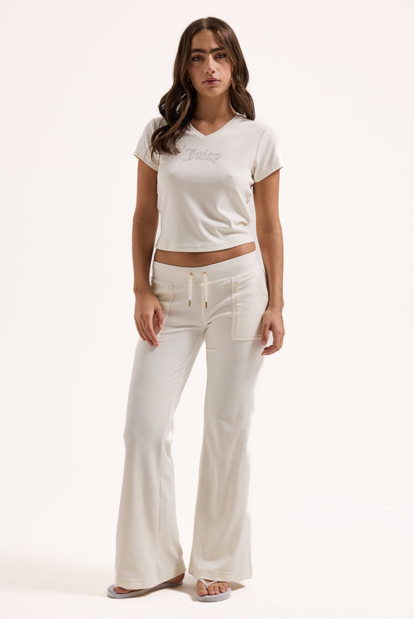 Displays a model wearing the cream 'Juicy' branded diamanté V Neck T-Shirt 