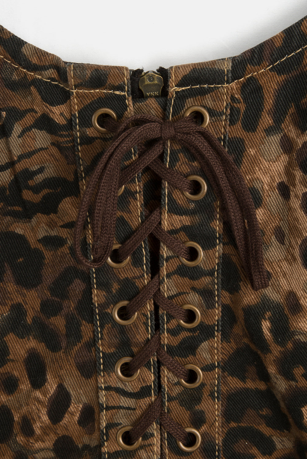 Displays the Animal 'Juicy' branded denim lace up corset featuring the details 