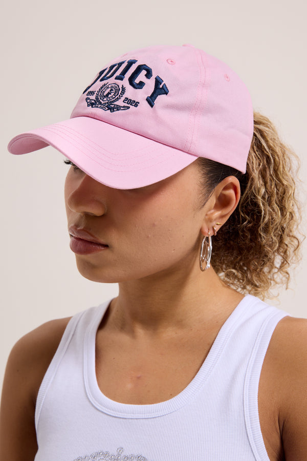 Displays a model wearing the Cherry Blossom 'Juicy' branded embroidered crest cap 