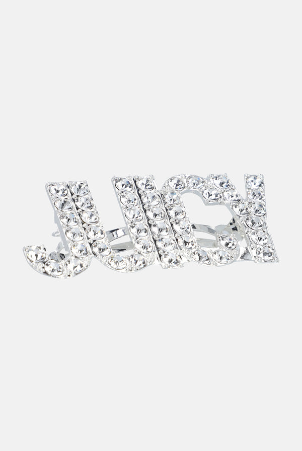 Displays the Crystal Silver 'Juicy' branded juicy hair clip 