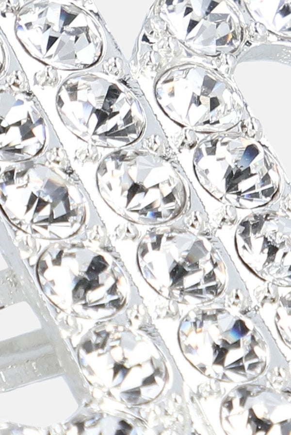 Displays the Crystal Silver 'Juicy' branded juicy hair clip featuring the details 