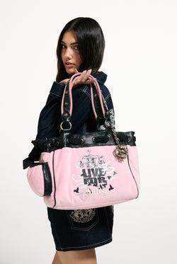 Displays a model wearing the Cherry Blossom 'Juicy' branded Live For Juicy Daydreamer Shopper Bag