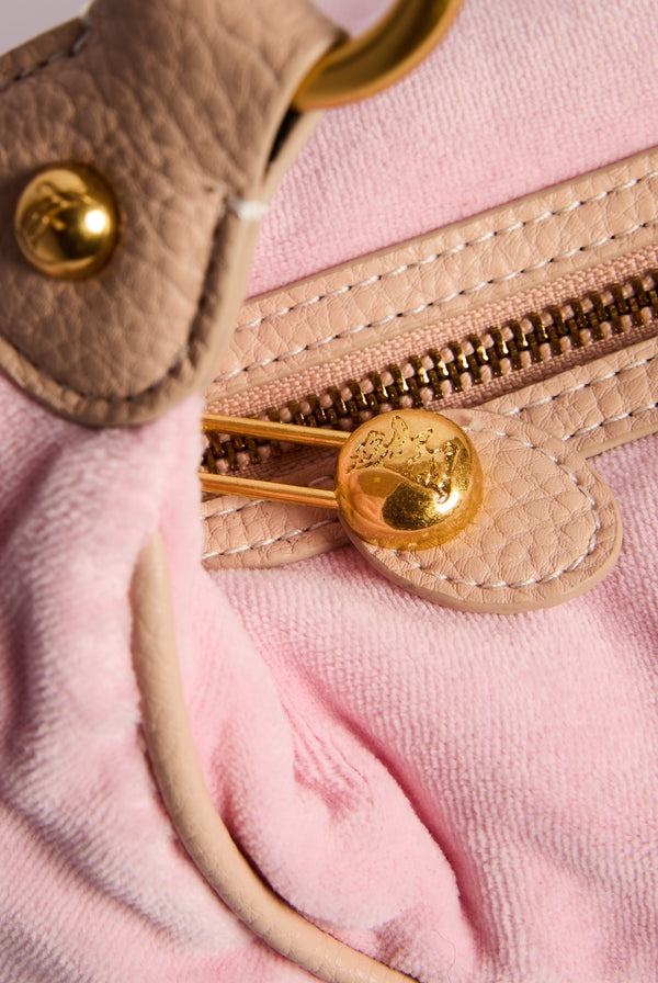 Displays the Juicy Pink 'Juicy' branded crest velour hobo bag 
