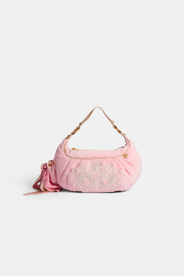 Displays the Juicy Pink 'Juicy' branded crest velour hobo bag 