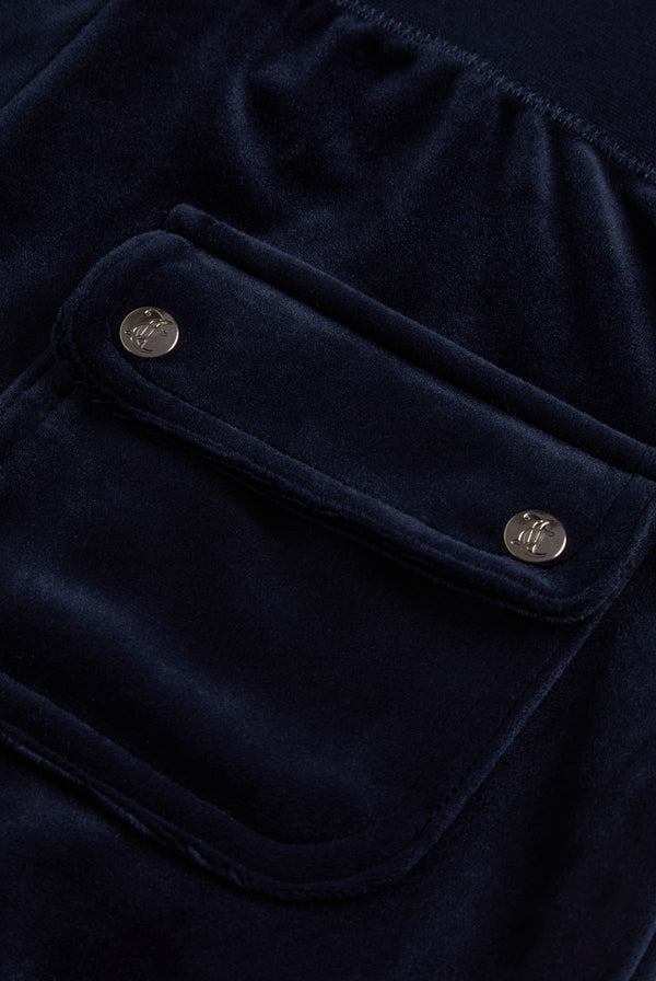 Juicy Couture Navy velour tracksuit bottoms - close up of the back pocket with two silver branded poppers