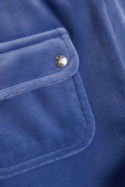 Displays the Grey Blue 'Juicy' branded classic velour del ray pocketed bottoms featuring the pockets  