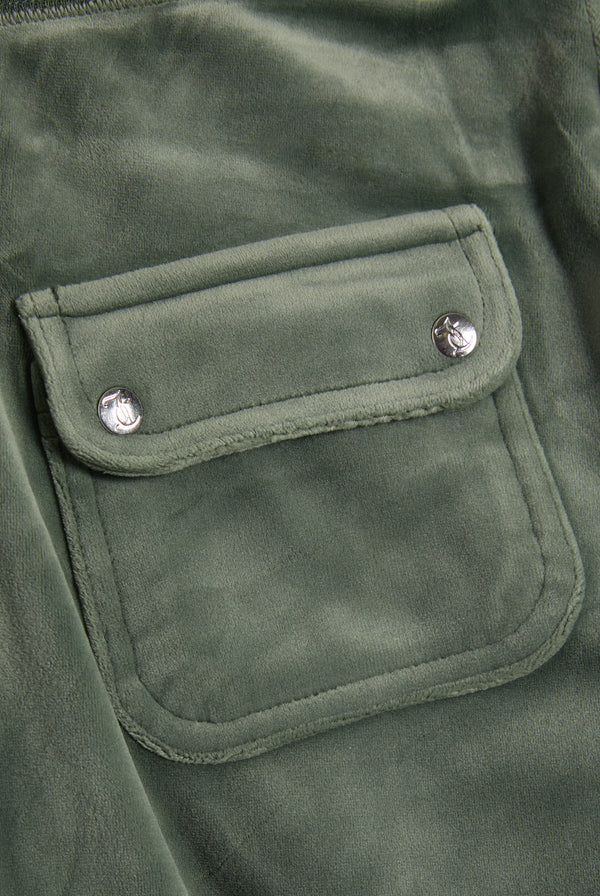 Displays the Thyme 'Juicy' branded classic velour del ray pocketed bottoms featuring the pockets  