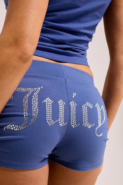 Displays a model wearing the Grey Blue Diamanté 'Juicy' branded ruched booty shorts 
