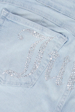 Displays the Bleached Demin 'Juicy' couture low rise flare diamanté jeans featuring the juicy branding 