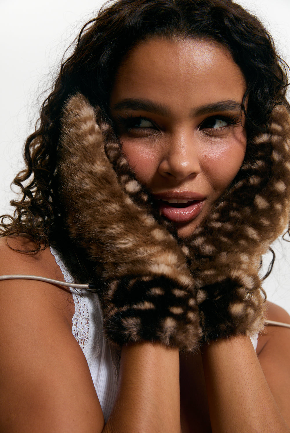 Displays a model wearing the Bambi Print 'Juicy' branded Drawstring Fur Mittens