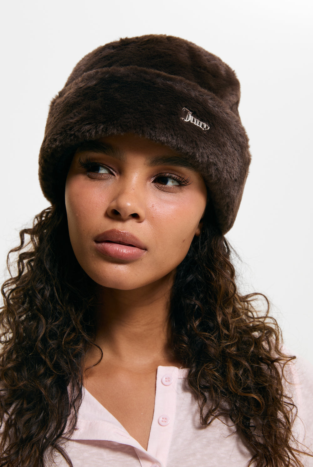 Displays a model wearing the Java 'Juicy' branded Faux Fur Hat