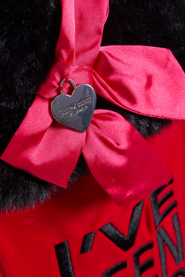 Displays the Red 'Juicy' branding 'I've been so good' stocking featuring a red ribbon 