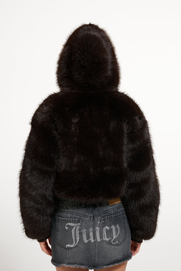 Displays a model wearing the Java 'Juicy' branded Hooded Faux Fur Jacket