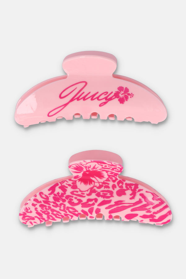 Displays a juicy pink 'juicy' branded 2 pack claw clips 
