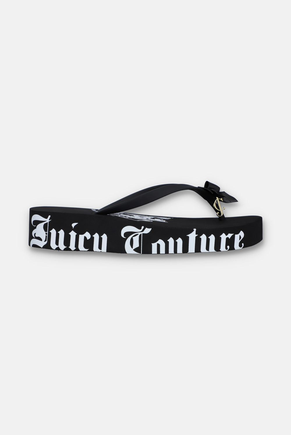 Displays the Black Heritage 'Juicy' branded wedge slide
