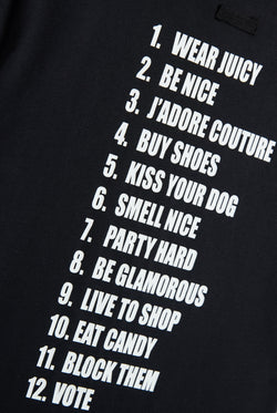 Displays the Black 'Juicy' branded HOW TO BE A JUICY GIRL T-SHIRT