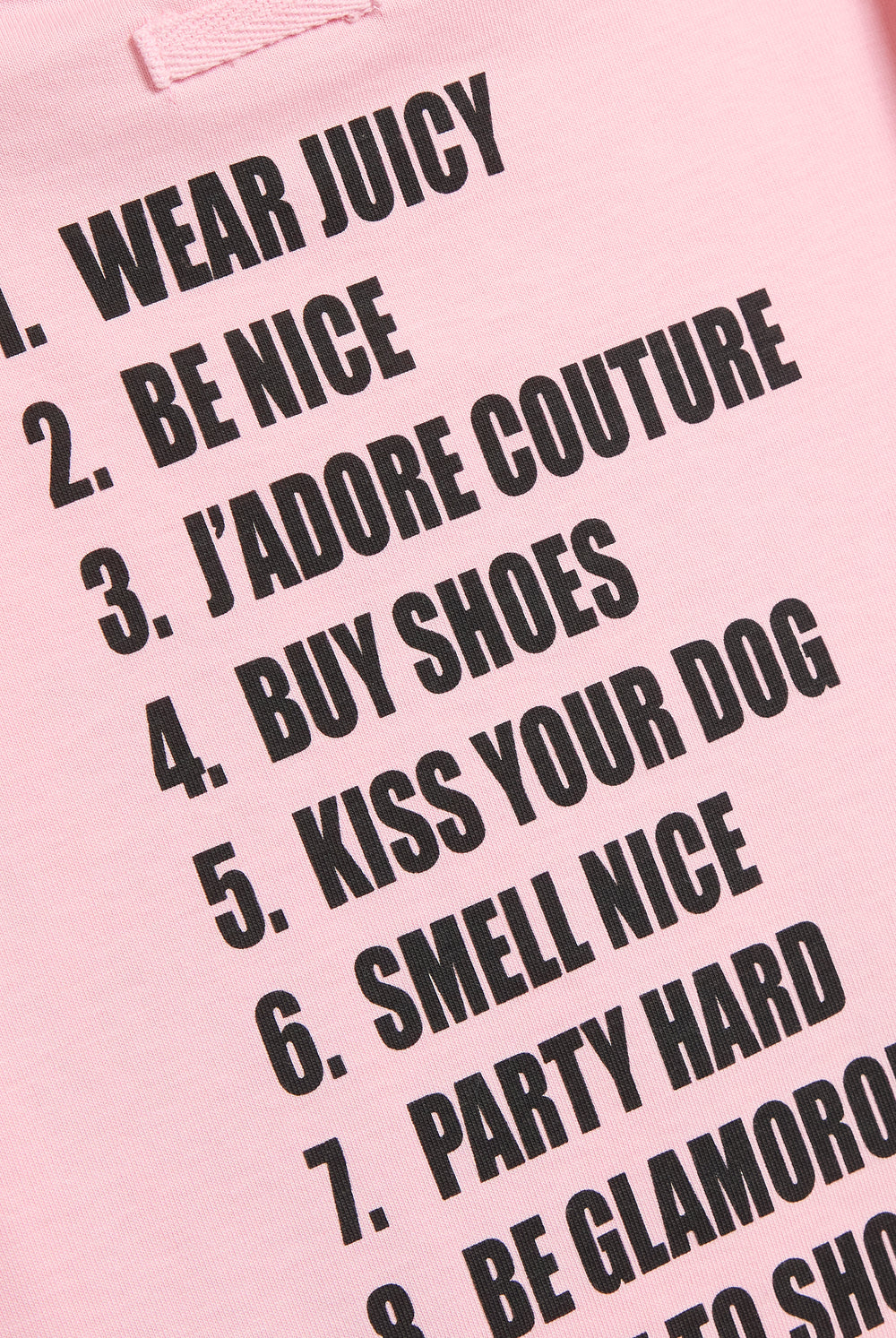 Displays the Juicy Pink 'Juicy' branded HOW TO BE A JUICY GIRL T-Shirt
