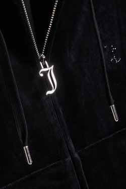 Displays the Black 'Juicy' branded outline diamanté oversized cropped hoodie featuring the juicy zip