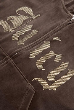 Displays the Java 'Juicy' branded Old Gothic Oversized Cropped Hoodie featuring the juicy branding details 