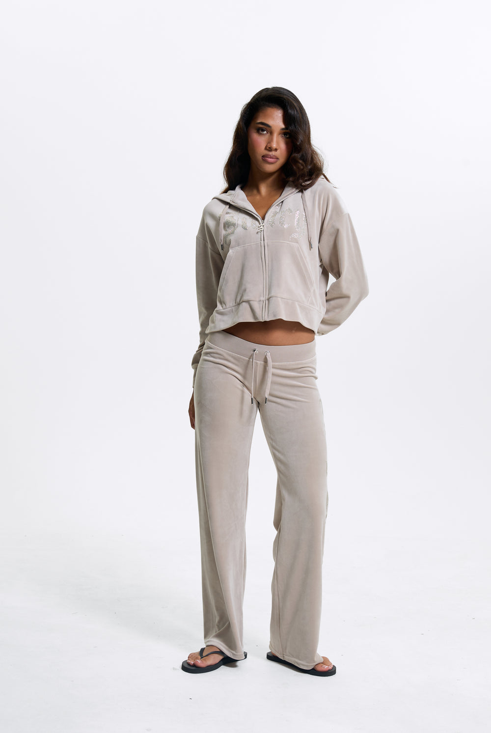 Displays a model wearing the String 'Juicy' branded Old Gothic Oversized Cropped Hoodie