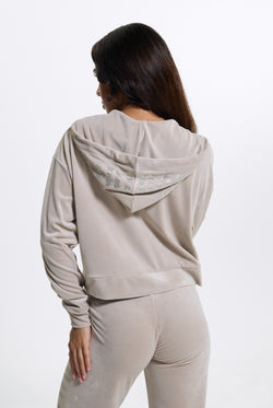 Displays a model wearing the String 'Juicy' branded Old Gothic Oversized Cropped Hoodie