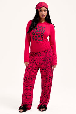 Displays a model wearing the toreador 'Juicy' I've been good pyjama set 