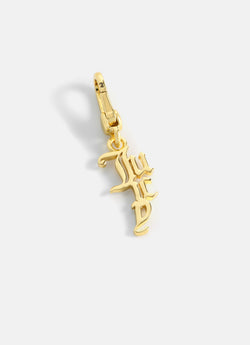 Displays the Gold 'Juicy' branded drop charm 
