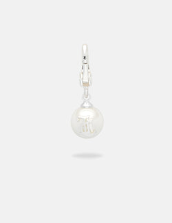 Displays the silver 'Juicy' branded JC pearl charm 