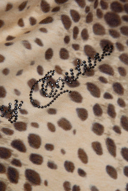 Displays the natural cheetah print 'juicy' branded off the shoulder jc top featuring juicy couture branding